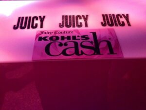 guests were given "Juicy cash" to redeem at an outside booth for a complimentary item from the new line
